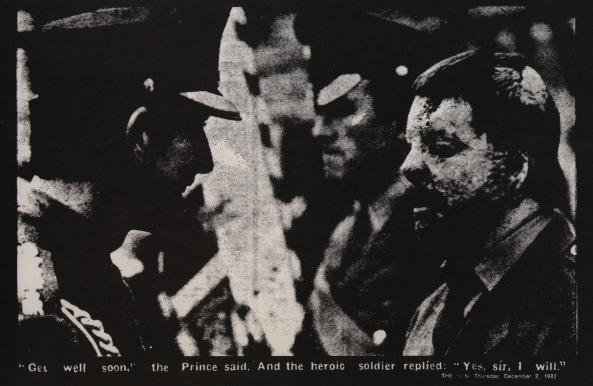 Photo from The Sun, Dec. 12, 1982, Prince Charles smiling into the mangled face of a soldier. The caption reads: 'Get well soon,' the Prince said. And the heroic soldier replied: 'Yes, sir, I will.'